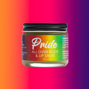 Close up jar of Pride all over body and lip salve.